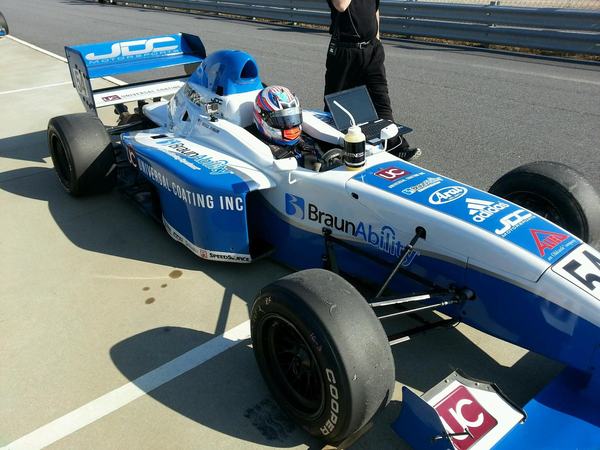 Michael’s open-wheel formula car in the paddock, 2015
