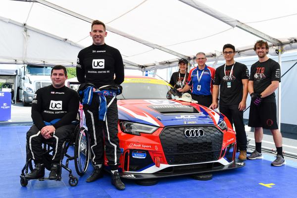 Michael and the team with the #54 Audi under the team tent, 2019