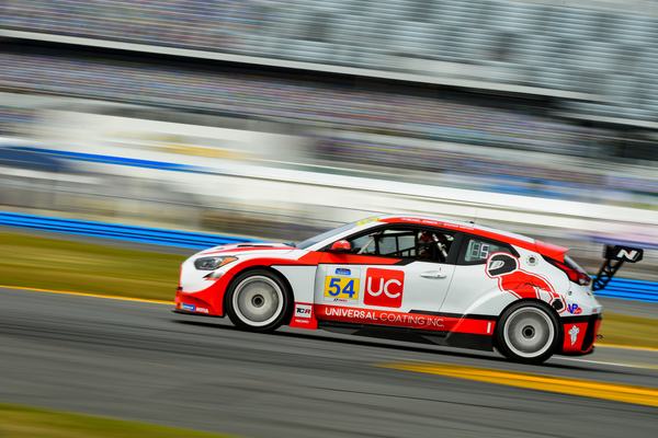 The #54 Hyundai Veloster N TCR on the Daytona banking, 2021