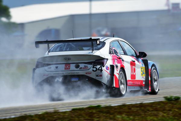 The #54 Elantra N smoking its tires, 2022
